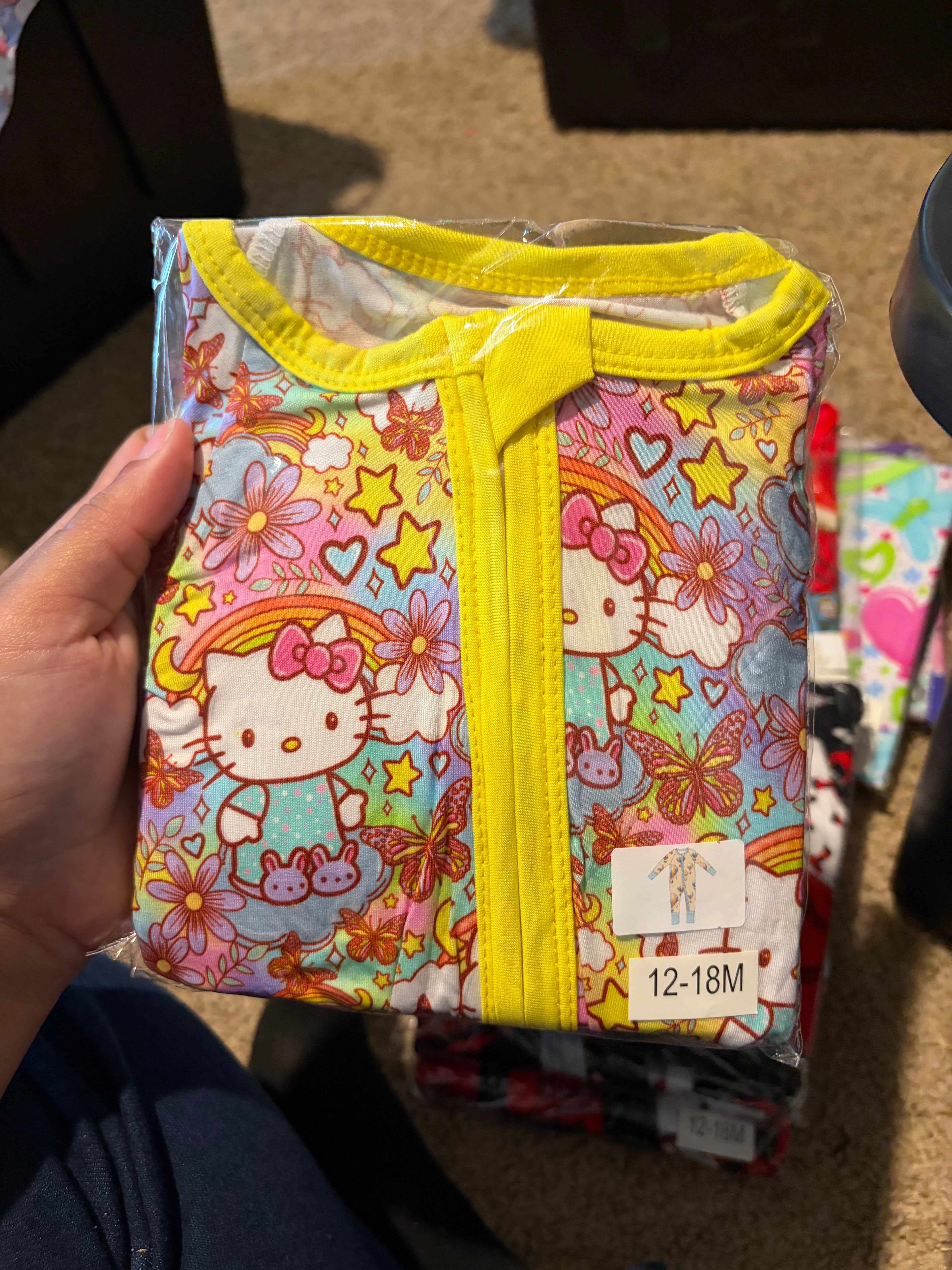 Rainbow Hello Kitty Zippy